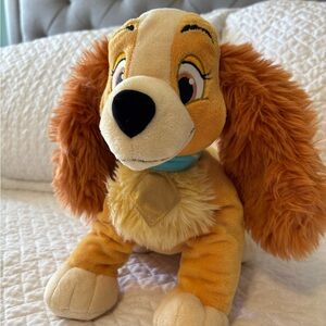Disney’s “Lady” from ‘Lady & the Tramp’.  Golden Brown plush Dog Toy